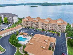 an aerial view of a resort with a lake at Smirnoff Pointe Lakefront in Hollister +24 photos