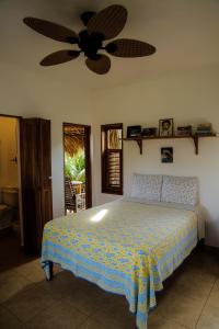 Säng eller sängar i ett rum på KuDehya Guesthouse
