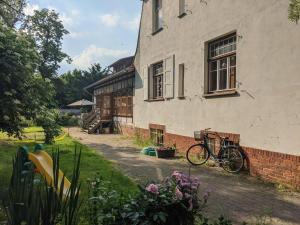 a bike parked in front of a building at Herberge Vitopia in Magdeburg