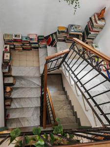 a staircase with a bunch of chairs on it at Nautilus in Cuglieri