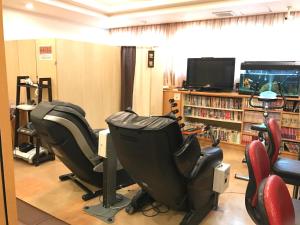 Una televisión o centro de entretenimiento en Heal In Yokkaichi