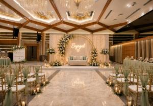 a wedding hall with a couch in the middle at Estrella The Resort in Karjat +40 photos