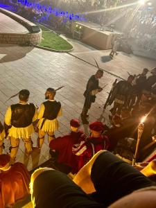 a group of men in costumes standing in a concert at Villa Saranda in Supetarska Draga +111 photos