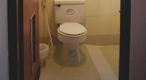 a bathroom with a white toilet in a room at EASTAN VIEW in Chiang Mai +69 photos