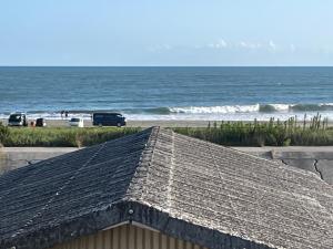 a roof of a house next to the beach at Iioka-classic in Asahi