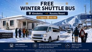 a white van parked next to a snow covered mountain at Koyuki Kimobetsu in Abuta