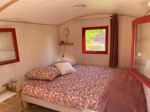 a bedroom with a bed in a small room at Domaine Casa Sana in Pillac +35 photos