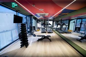 an empty gym with treadmills and mirrors in it at IBIS STYLES PETROLINA in Petrolina