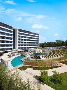 a resort with a swimming pool and a hotel at The Encore Hotel Nakuru in Nakuru