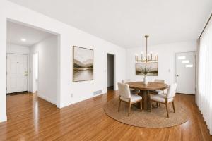 a dining room with a table and chairs at MOUNTAIN WILLOW GETAWAY in Jackson