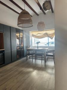 a dining room with a table and chairs at Casa Capereta in Alberique