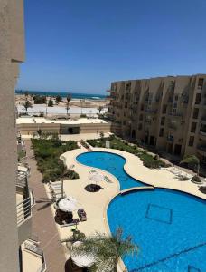 a view of a swimming pool at a resort at منتجع البرنسيسة ريزورت الغردقه in Hurghada +11 photos