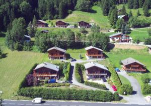 an aerial view of a house on a hill at Two Bedroom Apartement Belle Vue in La Chapelle-dʼAbondance