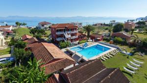 an aerial view of a house with a swimming pool at Palma Sidari Corfu in Sidari