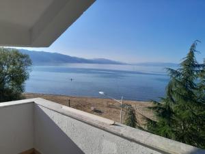 a view of a body of water from a house at Hotel Engjell in Pogradec