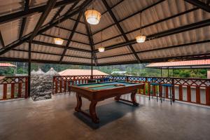 a pool table in the middle of a room at QUINTA PRIMAVERA - Hostería Campestre in Nueva Loja