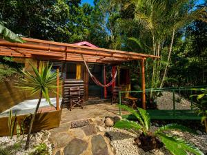 a small house with a patio in front of it at El Sol Monteverde in Monteverde Costa Rica
