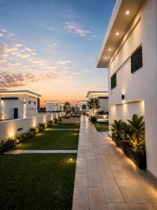 a view of the backyard of a house at dusk at Gurgaon Legacy in Gurgaon