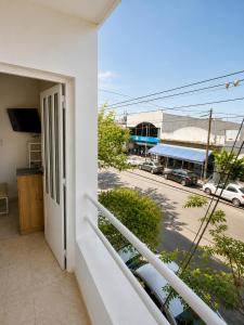 a balcony with a view of a street at Center Studio 3pax apartamento in Trelew