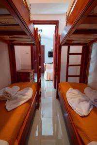 two bunk beds in a room with a hallway at Bungalow - Camping Apollon in Delphi +52 photos
