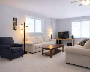 a living room with two couches and a coffee table at PRAIRIE SKY GETAWAY in Cheyenne