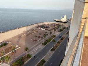 an aerial view of a street next to the ocean at Residence La corniche Étage 2 in Nador