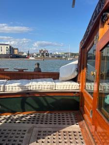 a deck of a boat in the water at Argovia Dutch Barge in Brightlingsea