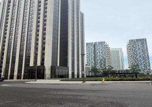 a large building with tall buildings in a city at SimplyBnB in Vaughan