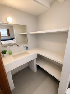 a bathroom with a sink and a mirror at Isla Risa in Cartagena de Indias +66 photos