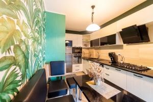 ครัวหรือมุมครัวของ CozyFlat in the central Arad