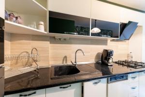 ครัวหรือมุมครัวของ CozyFlat in the central Arad