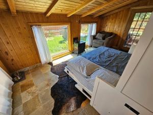 an overhead view of a bedroom with a bed in a room at The Hollo House in Laramie