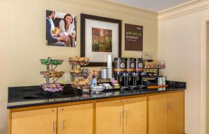a kitchen with a counter with some food on it at Extended Stay America Suites - Richmond - W Broad Street - Glenside - North in Richmond