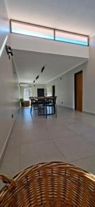 a large room with a table and chairs in it at Casa Prado in San Fernando del Valle de Catamarca