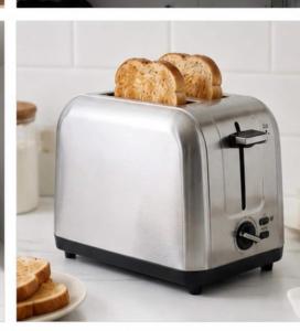 a toaster with bread on top of it on a counter at Private Suite with Laundry in Sunset