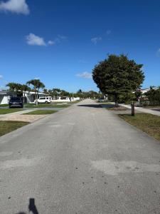 an empty road with a tree in a house at Private Suite with Laundry in Sunset