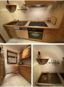 a kitchen with a stove and a sink at Ferienwohnung am Rande des Rothaarsteigs in Kreuztal