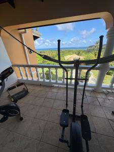 a room with a balcony with a view of the ocean at Ocean veiw Apartment in Telescope