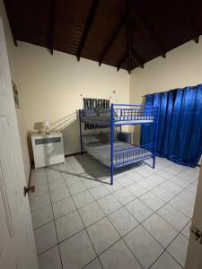 a bedroom with two bunk beds in a room at Ocean veiw Apartment in Telescope