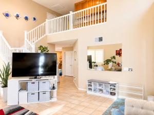a living room with a large flat screen tv at Balloons and Wine in Murrieta