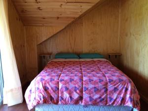Postel nebo postele na pokoji v ubytování Camping & Hospedaje Rio Laja