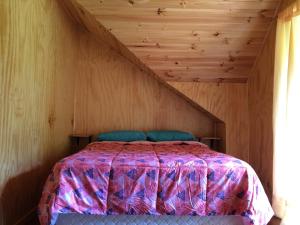 Postel nebo postele na pokoji v ubytování Camping & Hospedaje Rio Laja