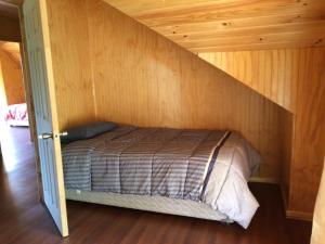 Postel nebo postele na pokoji v ubytování Camping & Hospedaje Rio Laja