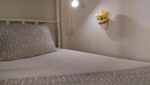 Postel nebo postele na pokoji v ubytování Salsa Hostel