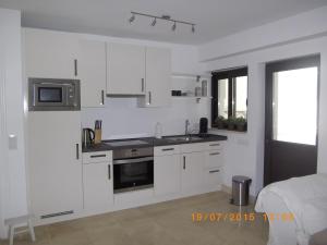 A kitchen or kitchenette at Casa Holandaluzas Marbella near Beach, with salt water Pool and private parking