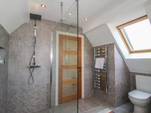 a bathroom with a shower and a toilet at White House in Montgomery +43 photos