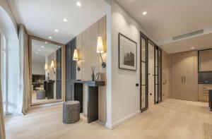 a hallway with a fireplace in a house at Vilnius Apartments & Suites – Old Town in Vilnius