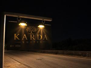 a sign that reads karadia suites at night at Villa Kazani by Karda Suites in Chios