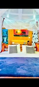a bedroom with a large bed with a canopy at Ella Jungle Rock in Ella +52 photos