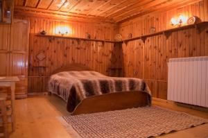 Llit o llits en una habitació de Bobi Guest House